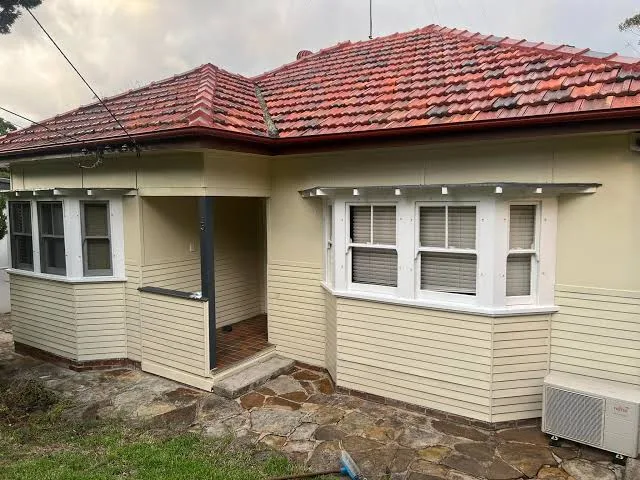 Older home with a tiled roof